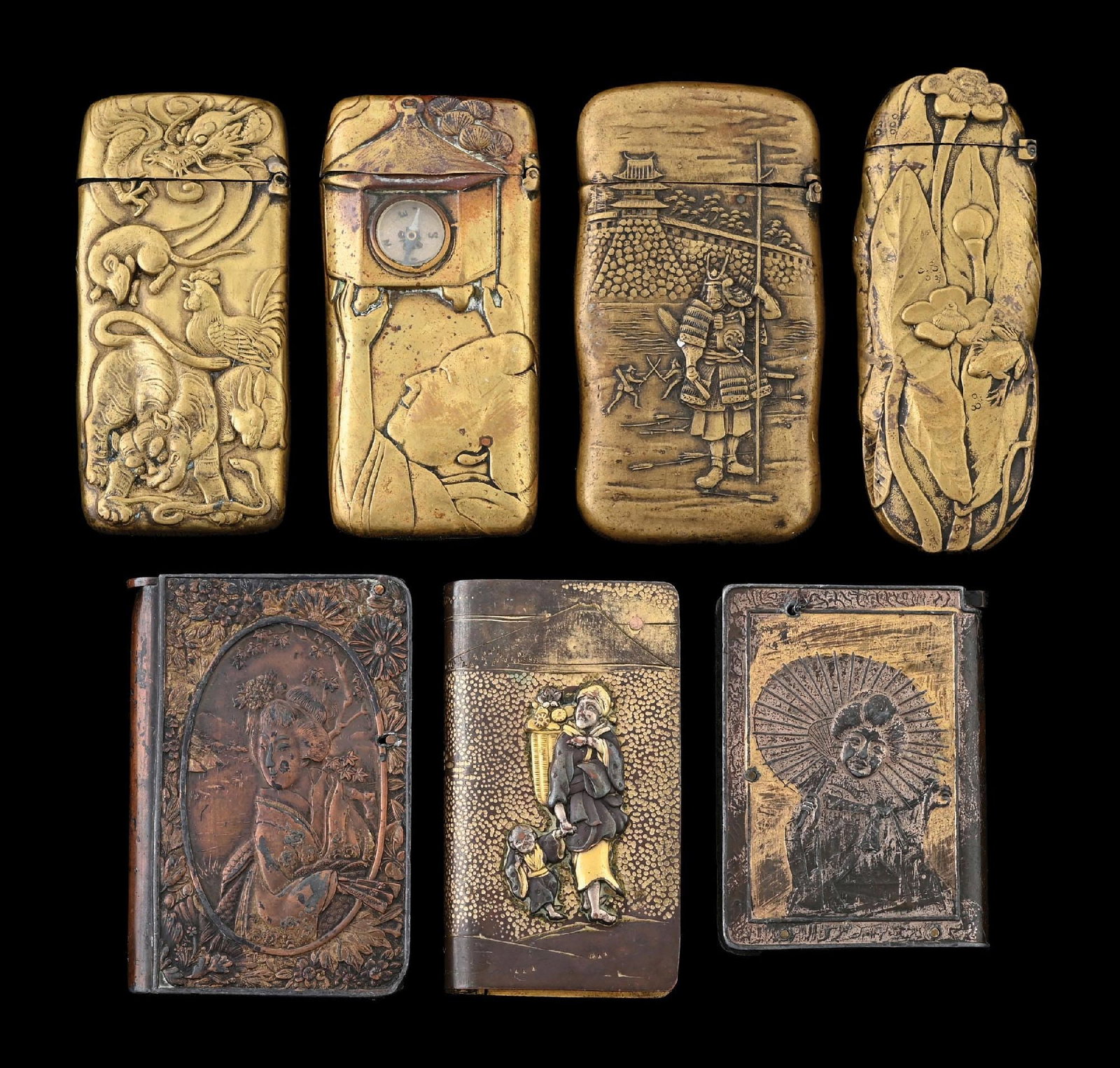 COLLECTION OF 7: JAPANESE BRASS MATCH SAFES: Nice grouping of 7 Japanese match safes. Great detail. From the portfolio of an avid and dedicated collector. Condition: Dimensions: Largest: 1 - 1/2" x 2 - 1/2".
