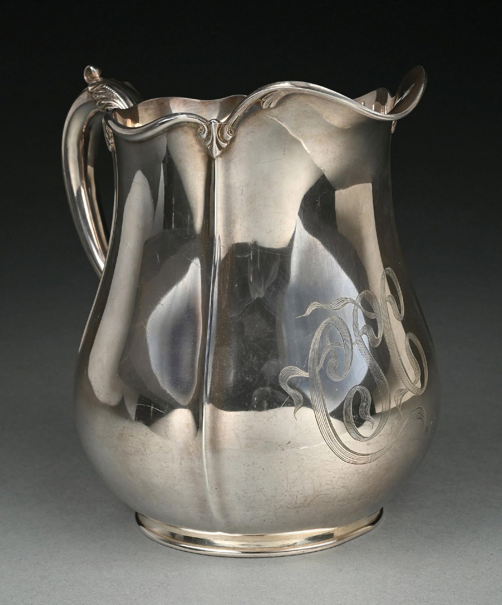 WOOD, BICKNALL & POTTER STERLING SILVER 5.5 PINT WATER PITCHER #912: Large central monogram. Gross weight: 29.1 ozt Condition: (Very Good - Excellent). Dimensions: