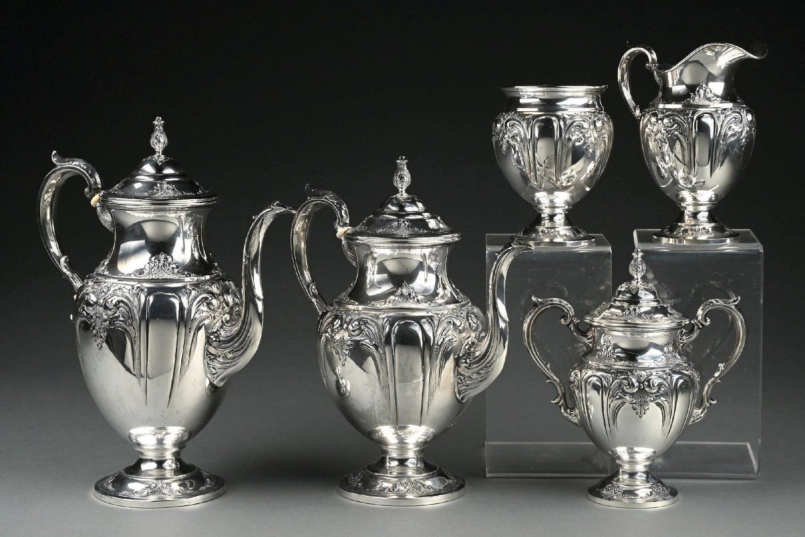 5-PIECE FISHER STERLING SILVER "VICTORIA" HAND CHASED BY J.H. VAN GELDER TEA SET: A 5-piece sterling silver Victoria tea set by J.H. Van Gelder. Gross weight: 91.9 ozt. Condition: (Excellent). Dimensions: