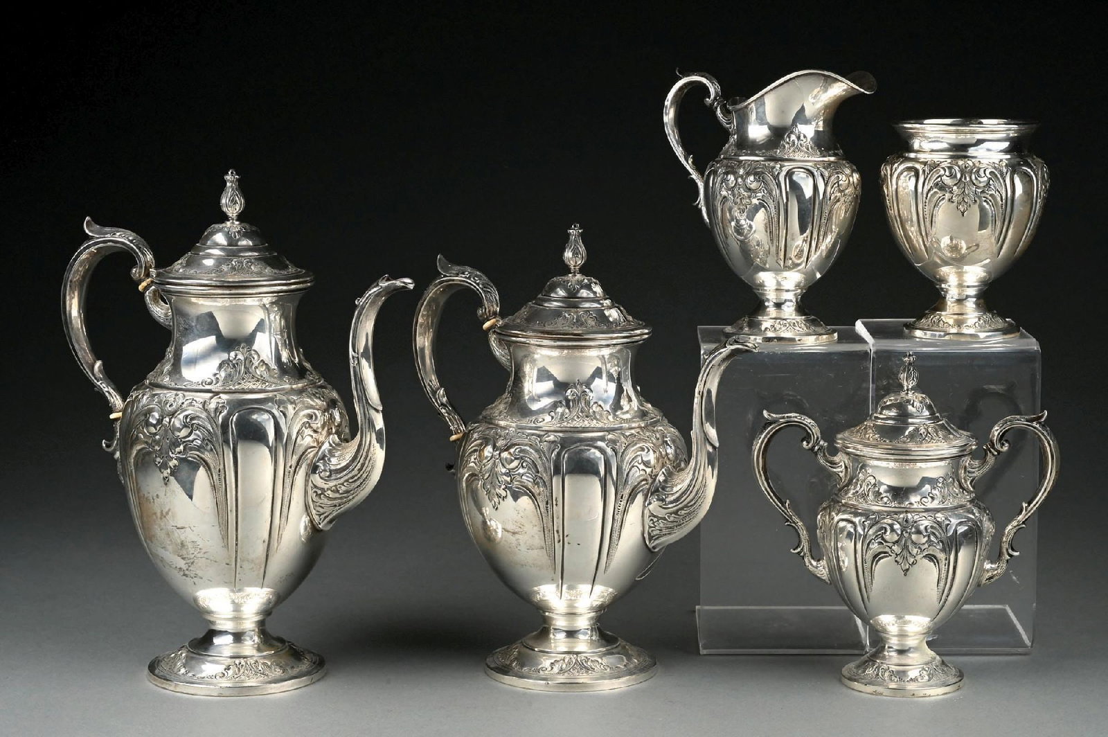 5-PIECE FISHER HAND CHASED STERLING SILVER "VICTORIA" 2300 TEA & COFFEE SET: Gross weight: 94.8 ozt Condition: (Very Good - Excellent). Dimensions: