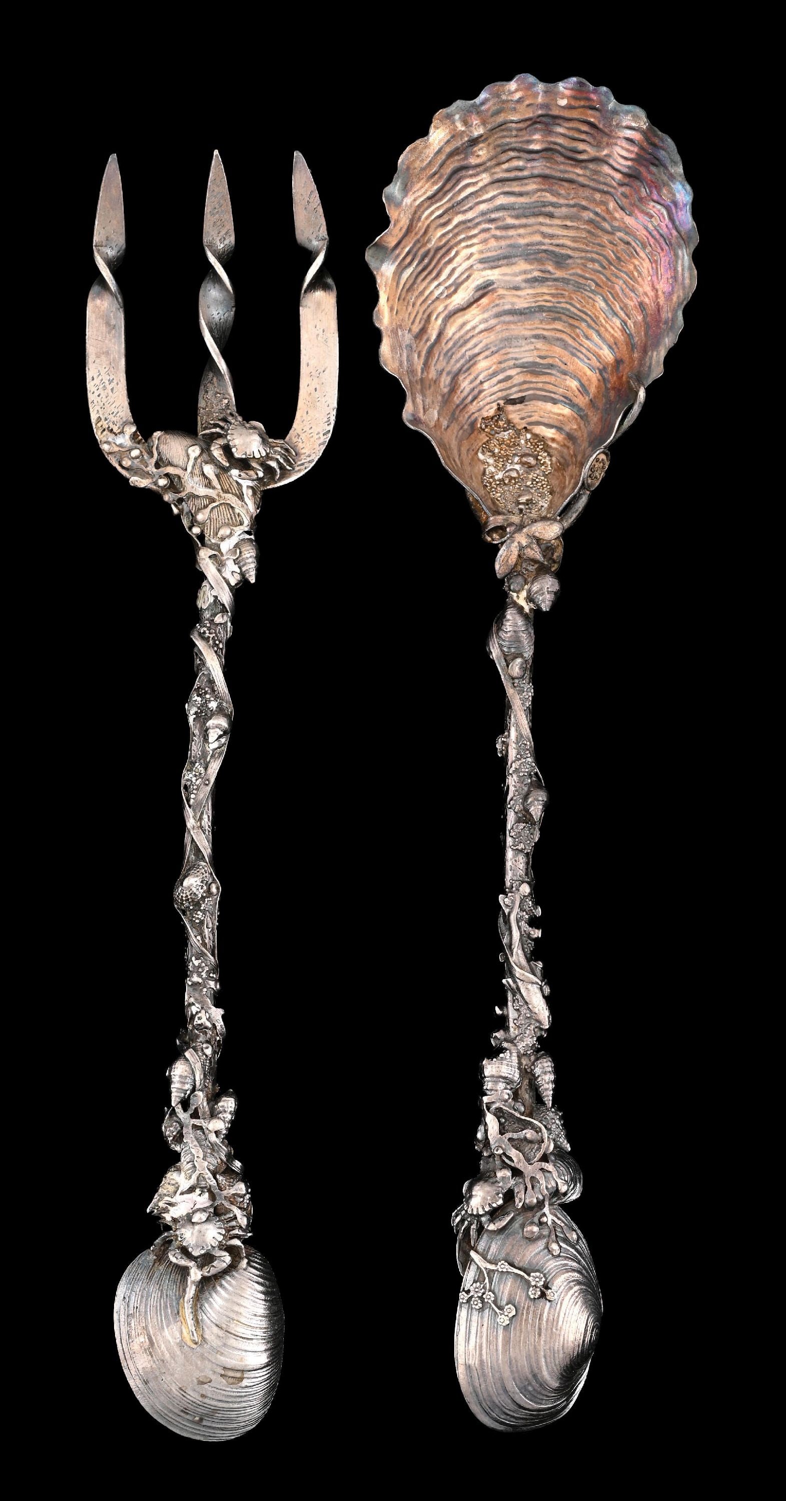 A PAIR OF GORHAM STERLING NARRAGANSETT PATTERN SERVERS: Each with a long stem applied with cast seaweed, crabs and various shells, the spoon chased as an oyster shell, the fork with twisted tines. Length of longest: 11-3/8". Total weight: 10.1 ozt. Conditi