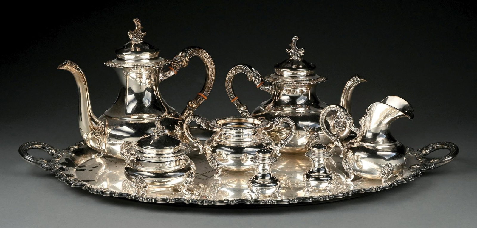 7-PIECE ALT-HEIDELBERG GERMAN .925 STERLING SILVER TEA SERVICE: Smaller pot with one small dent, superficial scratches to surface of tray. Gross weight: 132.5 ozt Condition: (Very Good - Excellent). Dimensions: