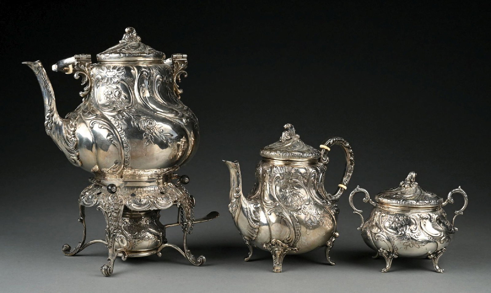 3-PIECE EUROPEAN REPOUSSE .800 SILVER FLORAL PATTERN TEA SET: Gross weight: 114.2 ozt Condition: (Very Good - Excellent). Dimensions: