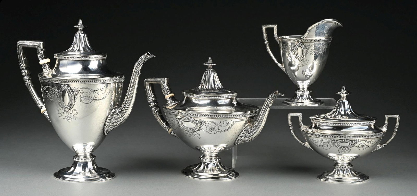 4-PIECE WALLACE STERLING SILVER HOLLOWWARE SCROLLS TEA & COFFEE SET: Minor dent to taller pot; otherwise, excellent condition. Gross weight: 89.4 ozt Condition: (Very Good - Excellent). Dimensions: