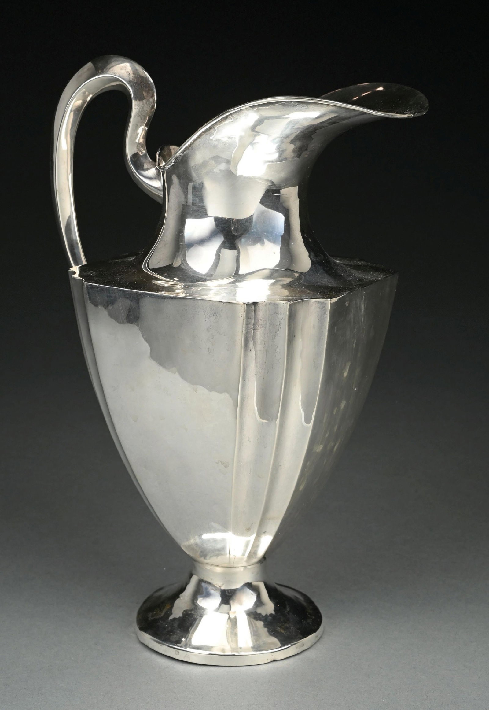 KIMBERLEY MEXICO STERLING .925 WATER PITCHER: Foot slightly bent; otherwise, excellent condition. Gross weight: 32.0 ozt Condition: (Very Good - Excellent). Dimensions: