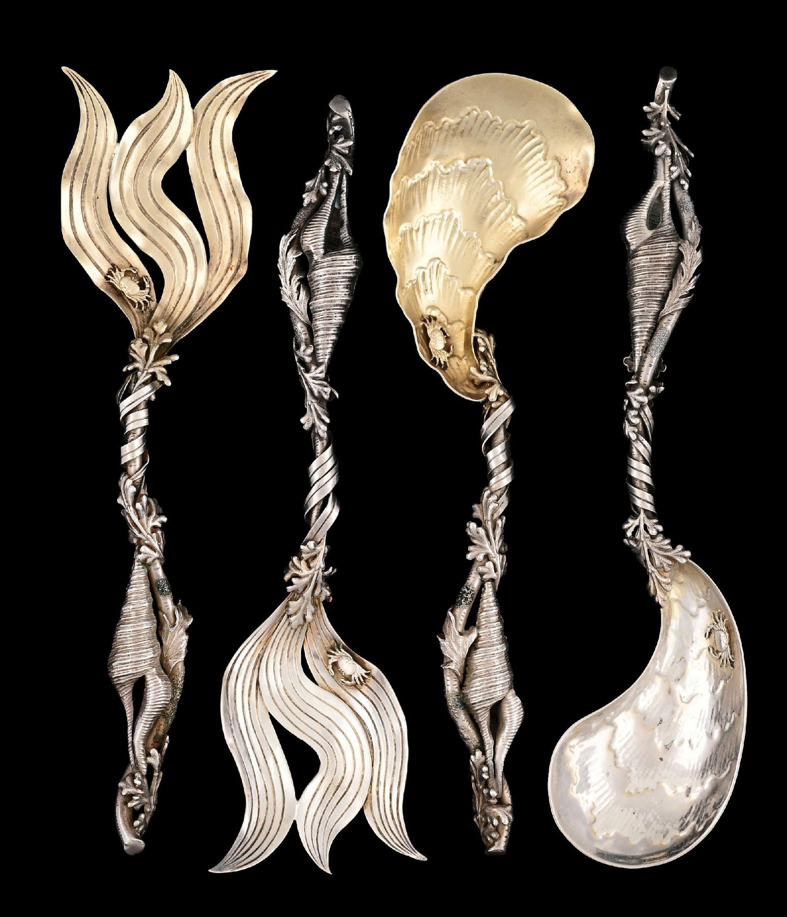 TWO PAIRS OF AMERICAN STERLING MARINE THEME SALAD SERVERS: 19th century, The first, Whiting, with cast and chased stems applied with shells and seaweed, the gilt bowls with cast crabs; the second, Shiebler, with stems applied with s fish and seaweed, the