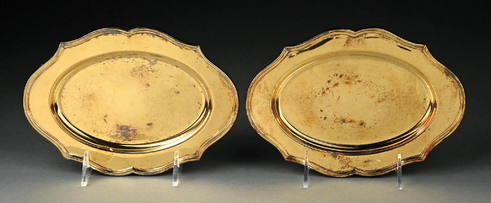 COLLECTION OF 2: GERRARD & CO. LTD. MADE IN ENGLAND GILDED SILVER SCALLOPED TRAYS: Minor scratches to tray surface on each. Gross weight: 20.7 ozt Condition: (Very Good - Excellent). Dimensions: