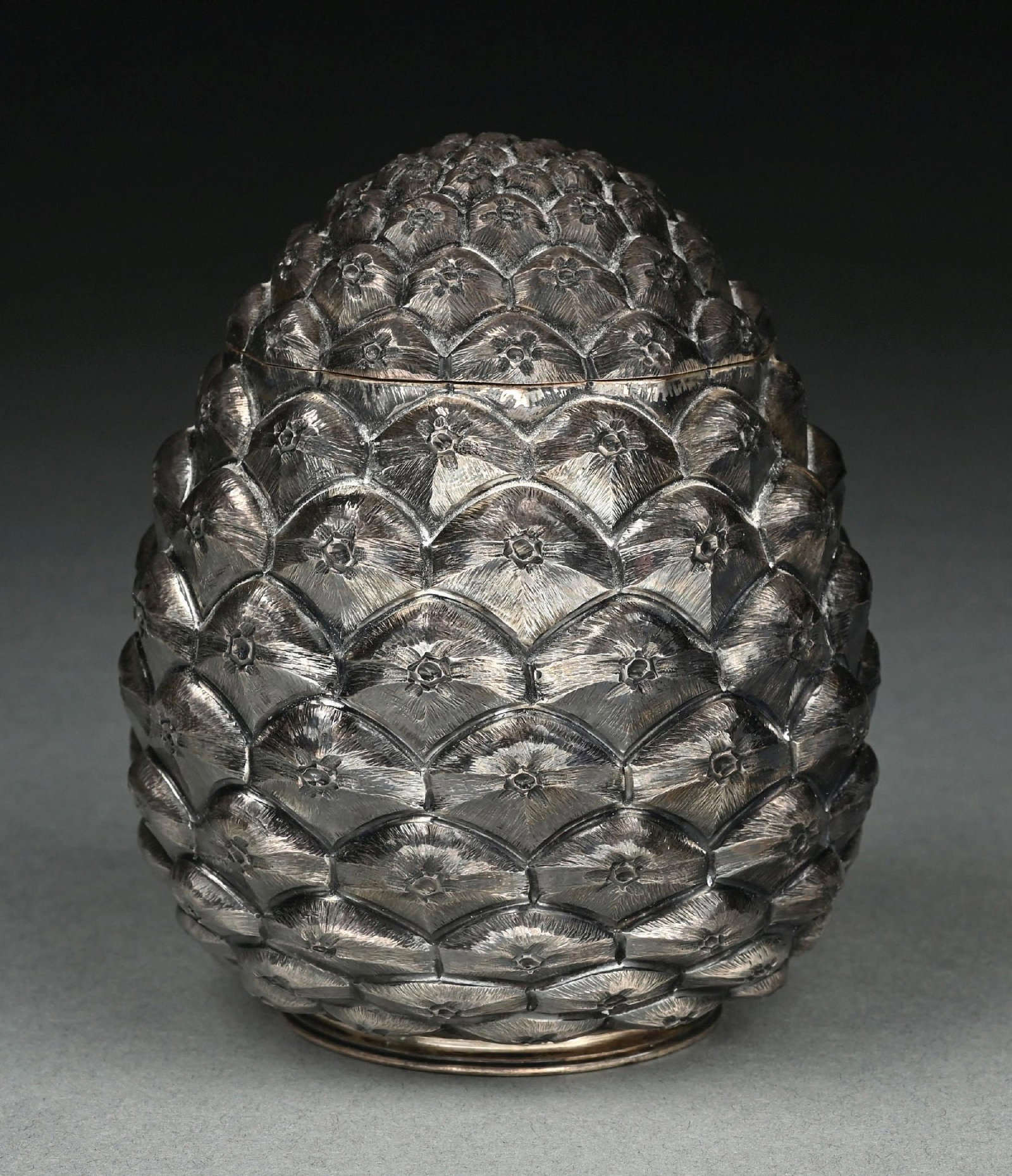 AN ITALIAN STERLING TEA CADDY: 20th century. In the form of a pine cone with a removable lid. Height: 4-3/4". Weight: 12.3 ozt. Condition: Dimensions: