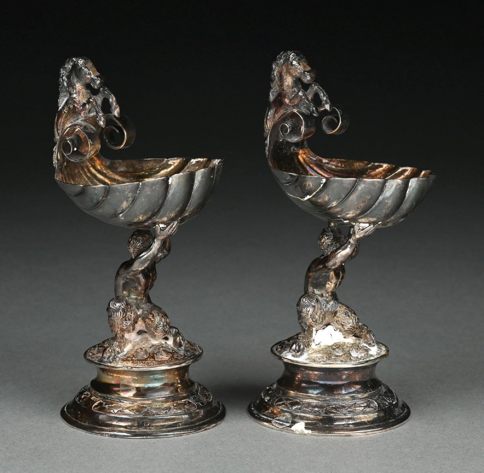 A PAIR OF CONTINENTAL SILVER FIGURAL SALTS (1 of 6)