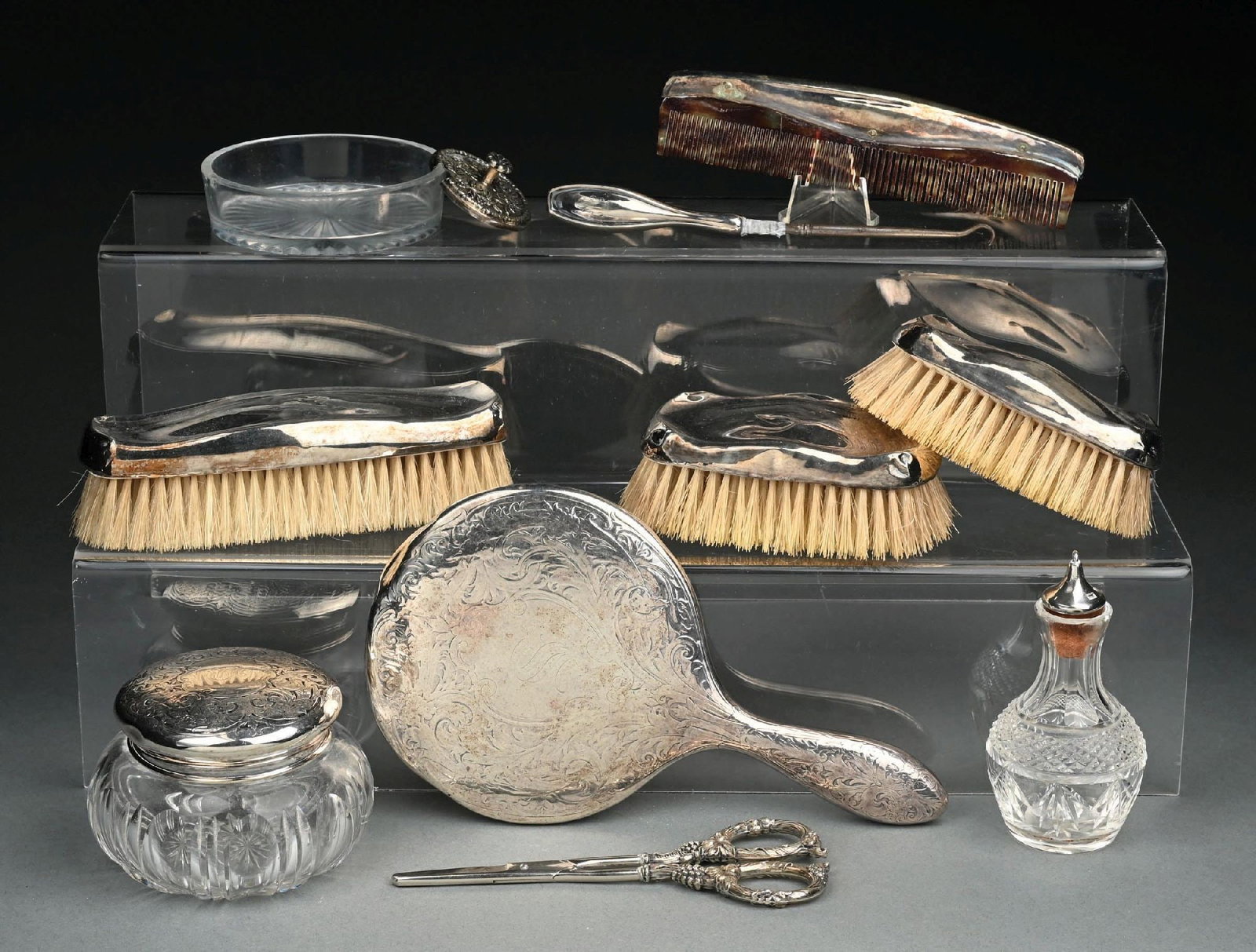 MIXED COLLECTION OF STERLING SILVER DRESSER ITEMS: All three brush handles are loose, with dents. Estimated gross weight: 12 ozt Condition: (Good - Very Good). Dimensions: