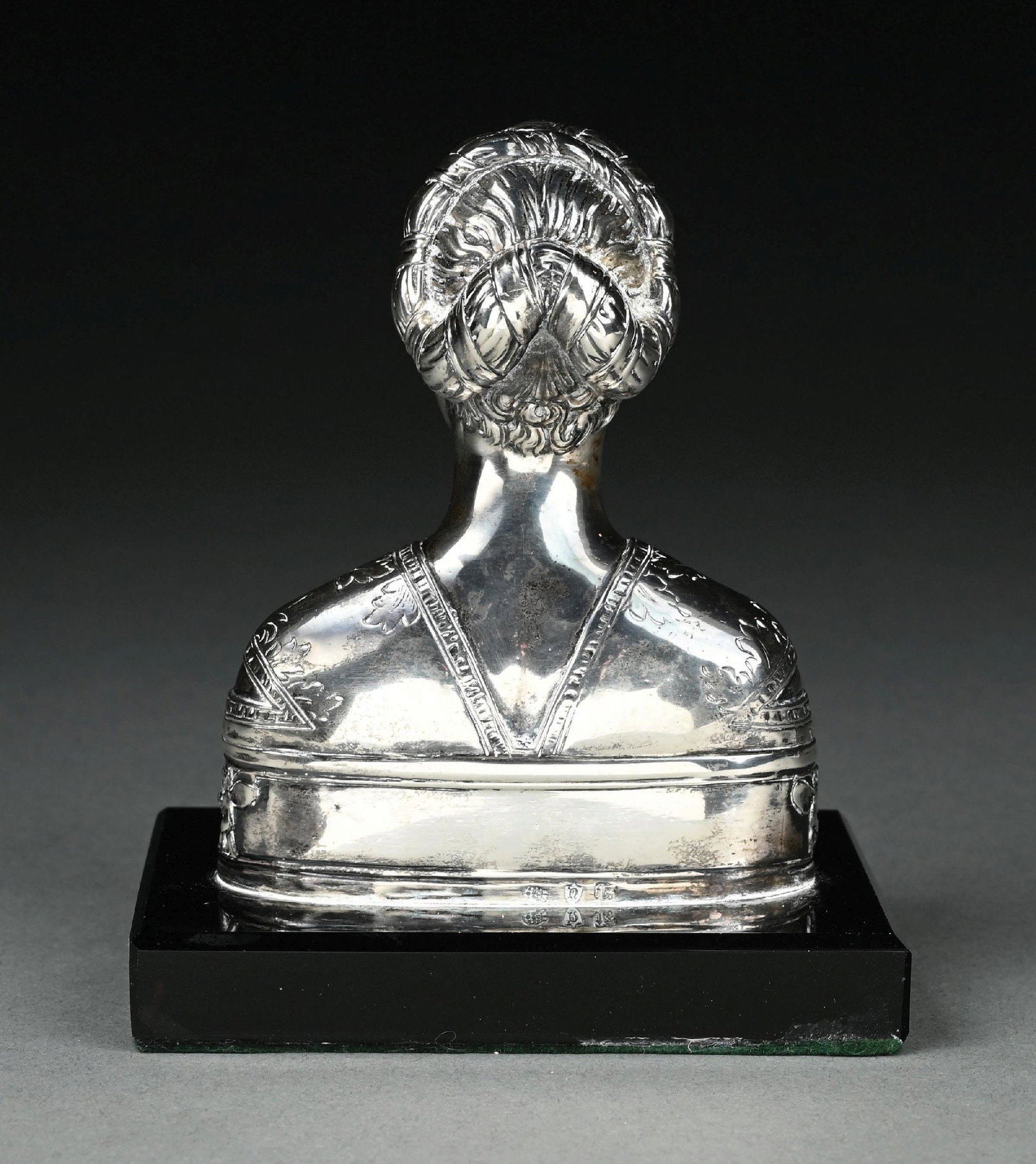 A SILVER COVERED BUST - 4