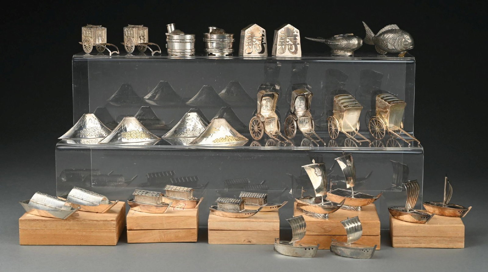 A GROUP OF JAPANESE FIGURAL SALT AND PEPPER CASTERS (1 of 4)