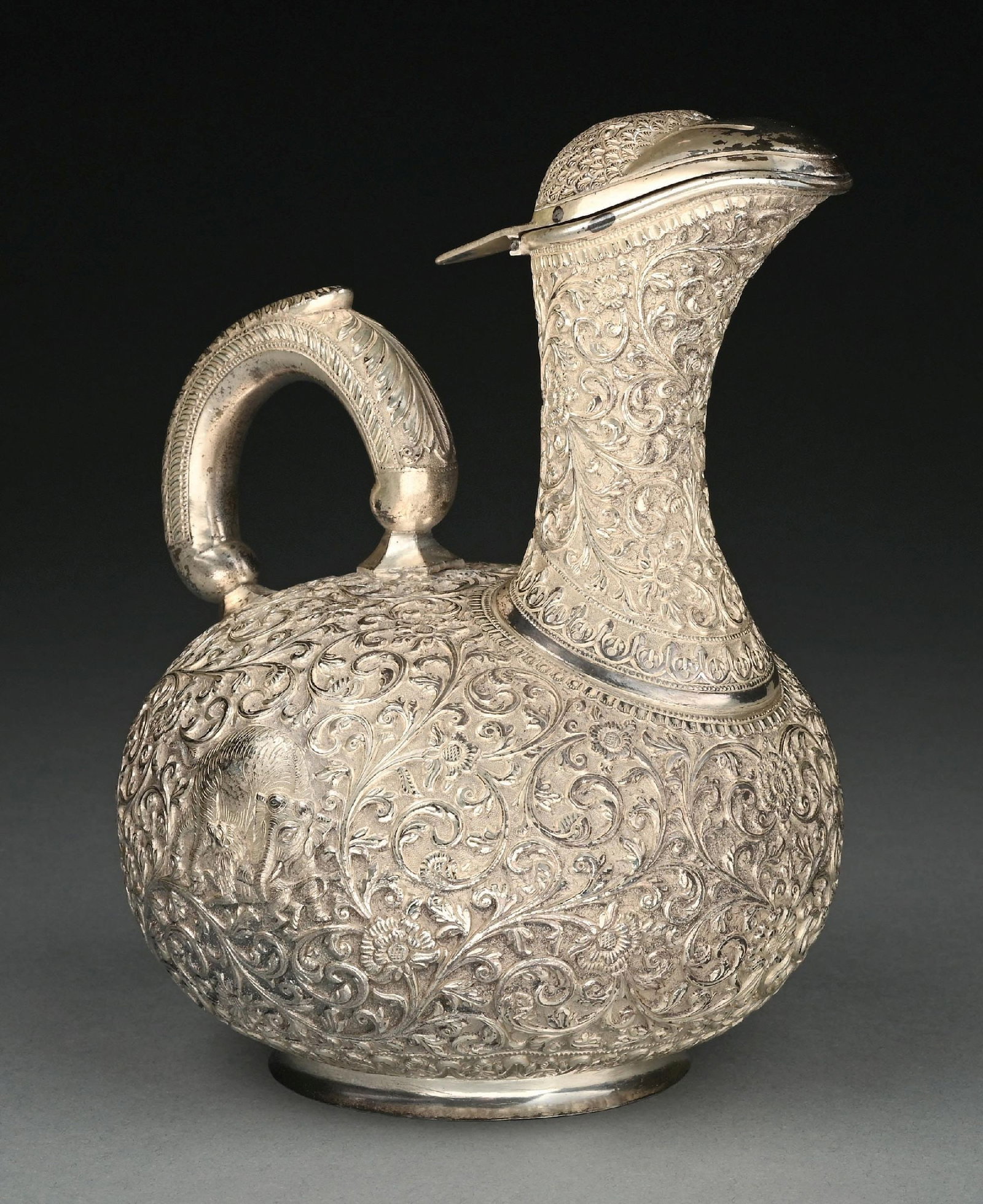 ANTIQUE REPOUSSE SILVER PLATE CLARET JUG (1 of 4)