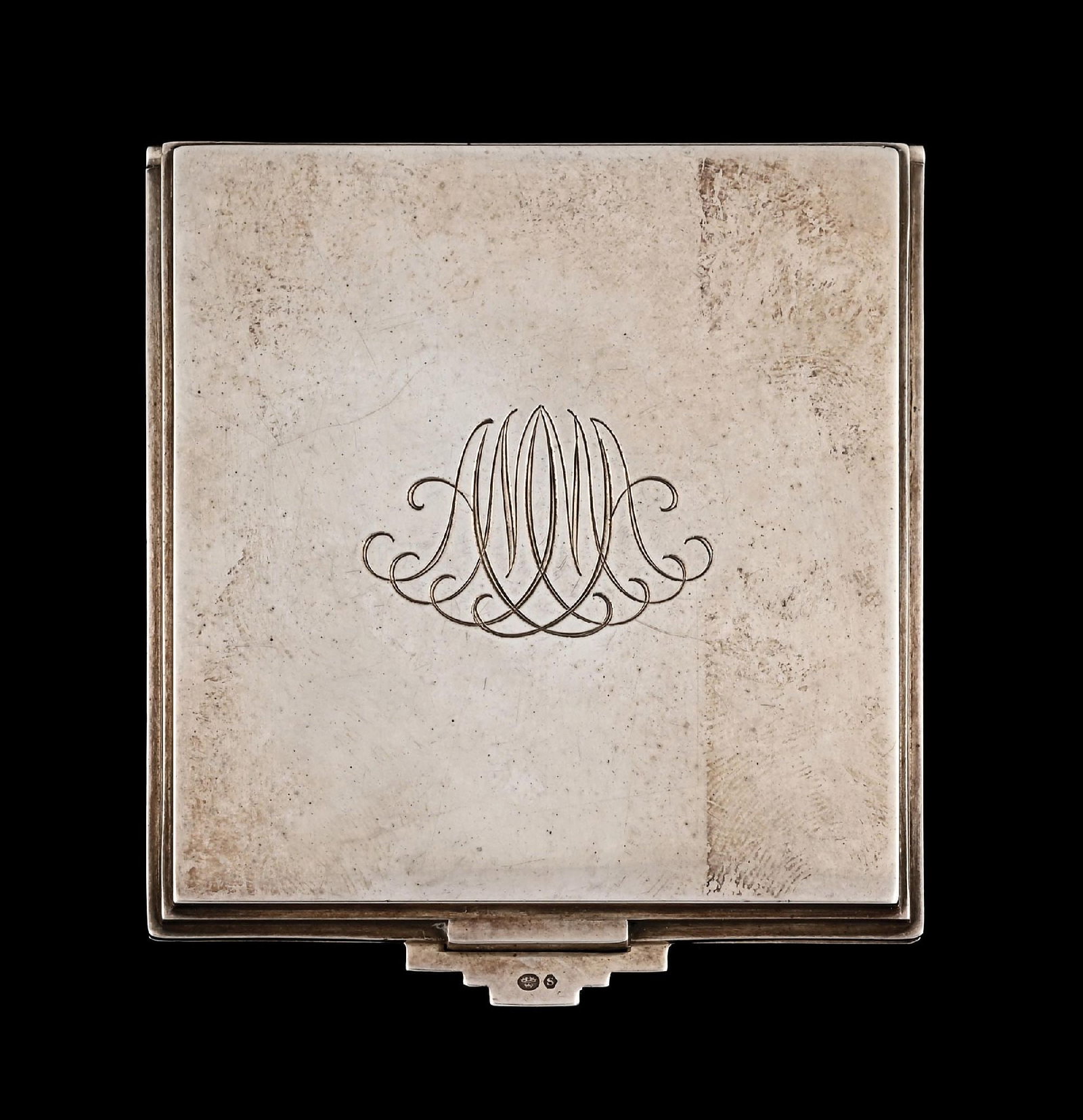 GEORG JENSEN STERLING SILVER MATCHBOOK: A lovely Art Deco-style sterling matchbook holder by Georg Jensen. The matchbook holder has a 2-1/4" diameter, and features a monogram on the front. Condition: (Very Good). Dimensions: