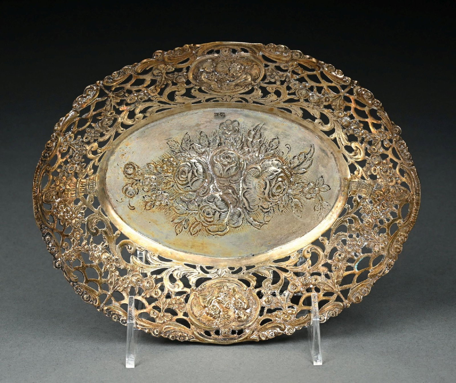 GERMAN .800 SILVER REPOUSSE FLORAL MOTIF PIERCED BREAD BASKET: Gross weight: 5.1 ozt Condition: (Very Good). Dimensions: