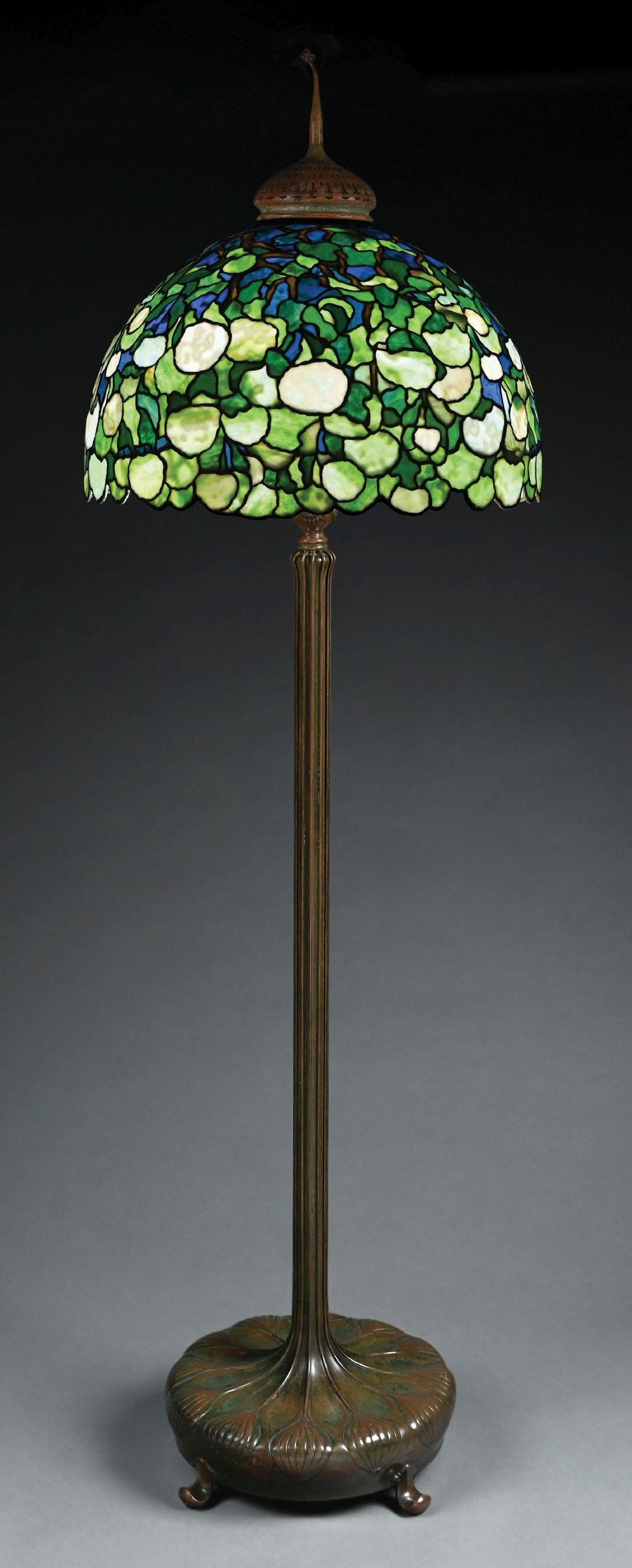 IMPORTANT TIFFANY STUDIOS HYDRANGEA "SNOWBALL" LEADED GLASS FLOOR LAMP: From the Collection of Seymour and Evelyn Holtzman. A gorgeous and important monumental example of the hydrangea floor lamp by Tiffany Studios. The 24" diameter leaded glass shade depicts the iconic h