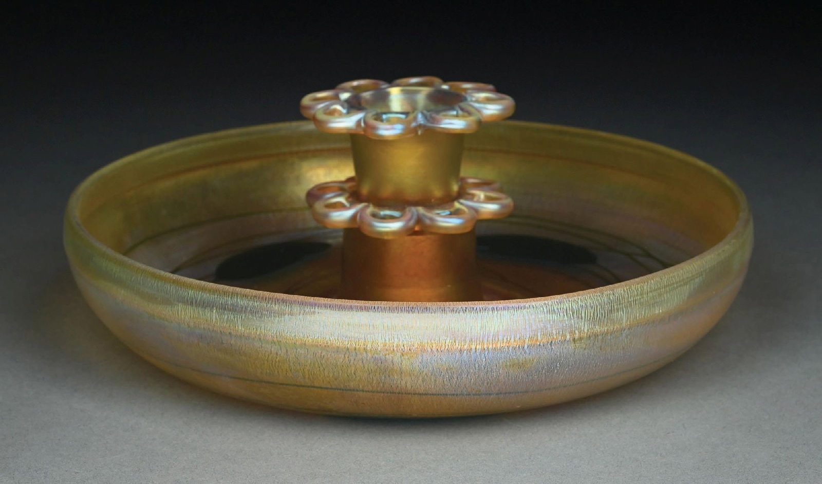 TIFFANY STUDIOS FAVRILE LEAF & VINE BOWL W/ FROG: A beautiful Tiffany Studios favrile bowl with frog. The 10" diameter gold bowl has a leaf and vine motif. Excellent condition, free of cracks or chips. Signed to the underside "Louis C. Tiffany Furnac