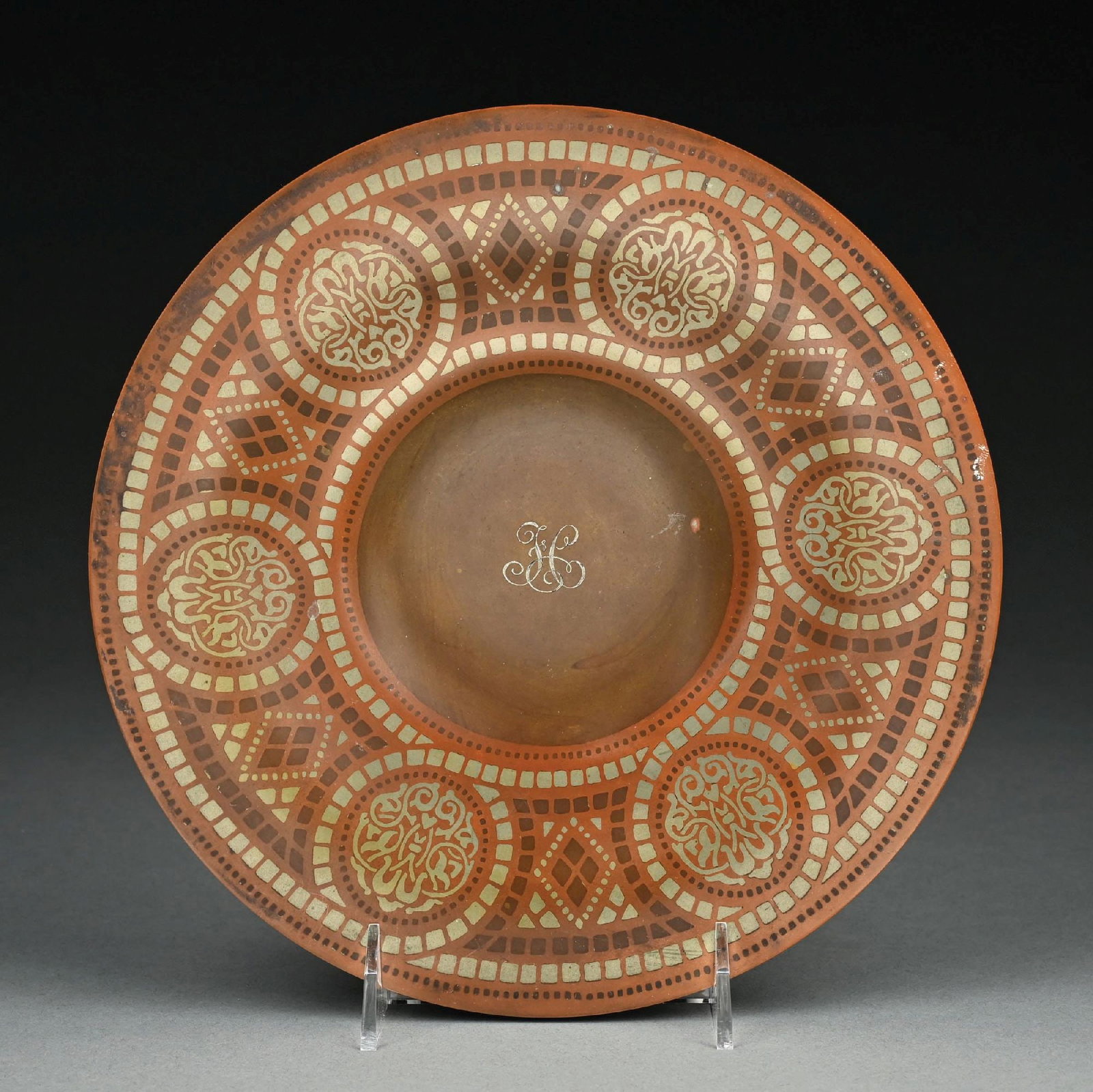 TIFFANY & CO. MIXED METAL INLAID COPPER BOWL: A beautiful decorated copper bowl by Tiffany & Co. The 9-3/4" diameter bowl with morish motif. Free of dents or cracks. Signed "Tiffany & Co." with central monogram. Condition: (Very Good). Dimensions