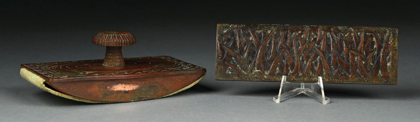 COLLECTION OF 2: TIFFANY STUDIOS BRONZE ROCKER BLOTTER & PAPERWEIGHT: A beautiful pair of patinated bronze Tiffany Studio items. (A) A rocker blotter with koi motif. Stamped "Tiffany Studios New York 1846". (B) A patinated bronze paperweight with grass motif. Stamped to