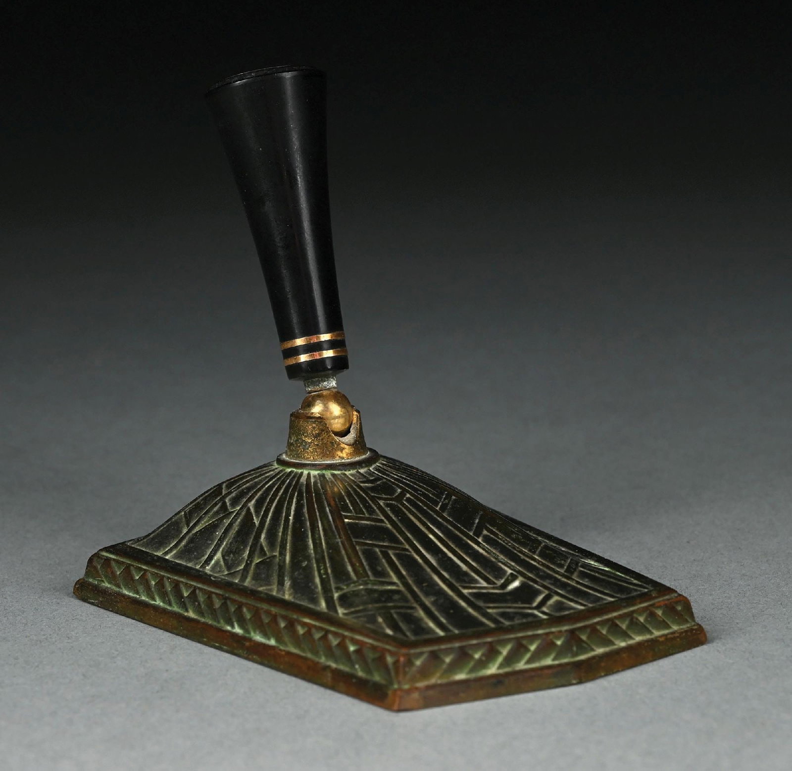 TIFFANY STUDIOS BRONZE ART DECO PEN HOLDER: A beautiful and rare patinated bronze pen holder by Tiffany Studios. The bronze pen holder has beautiful Art Deco styling, finished in a dark brown patina. The underside is stamped "Tiffany Studios Ne