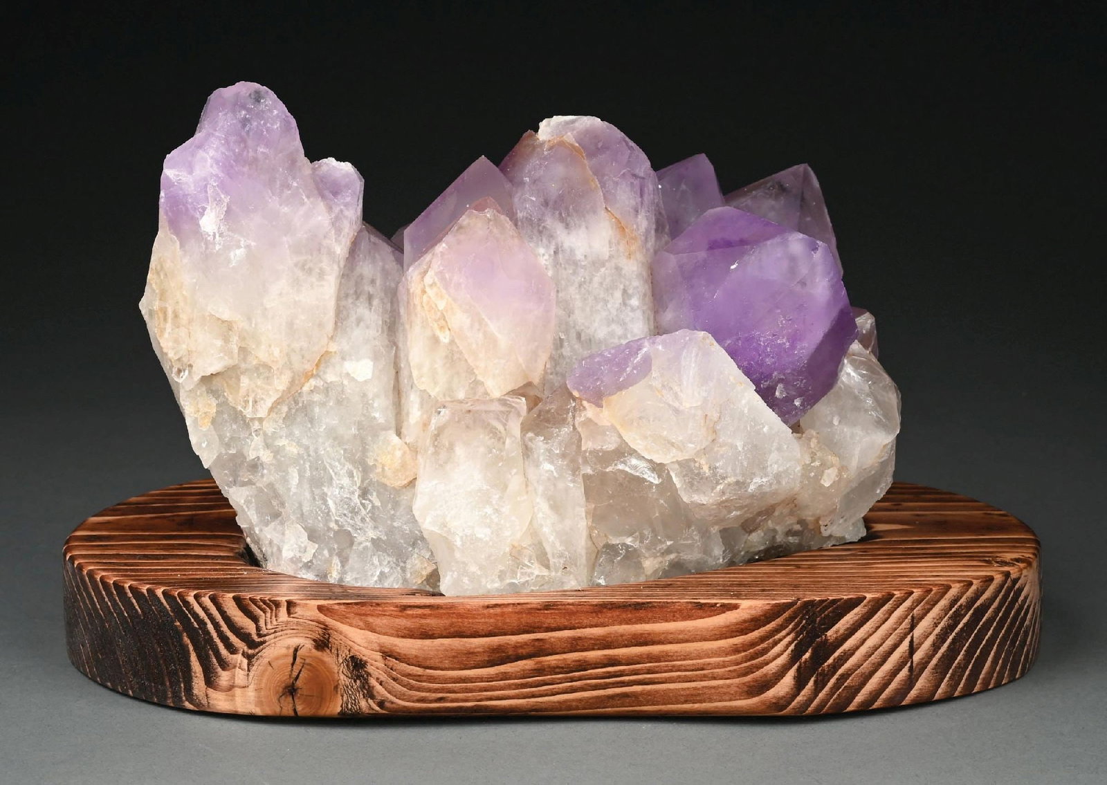 LARGE BOLIVIAN AMETHYST CRYSTAL CLUSTER ON WOODEN BASE (1 of 4)