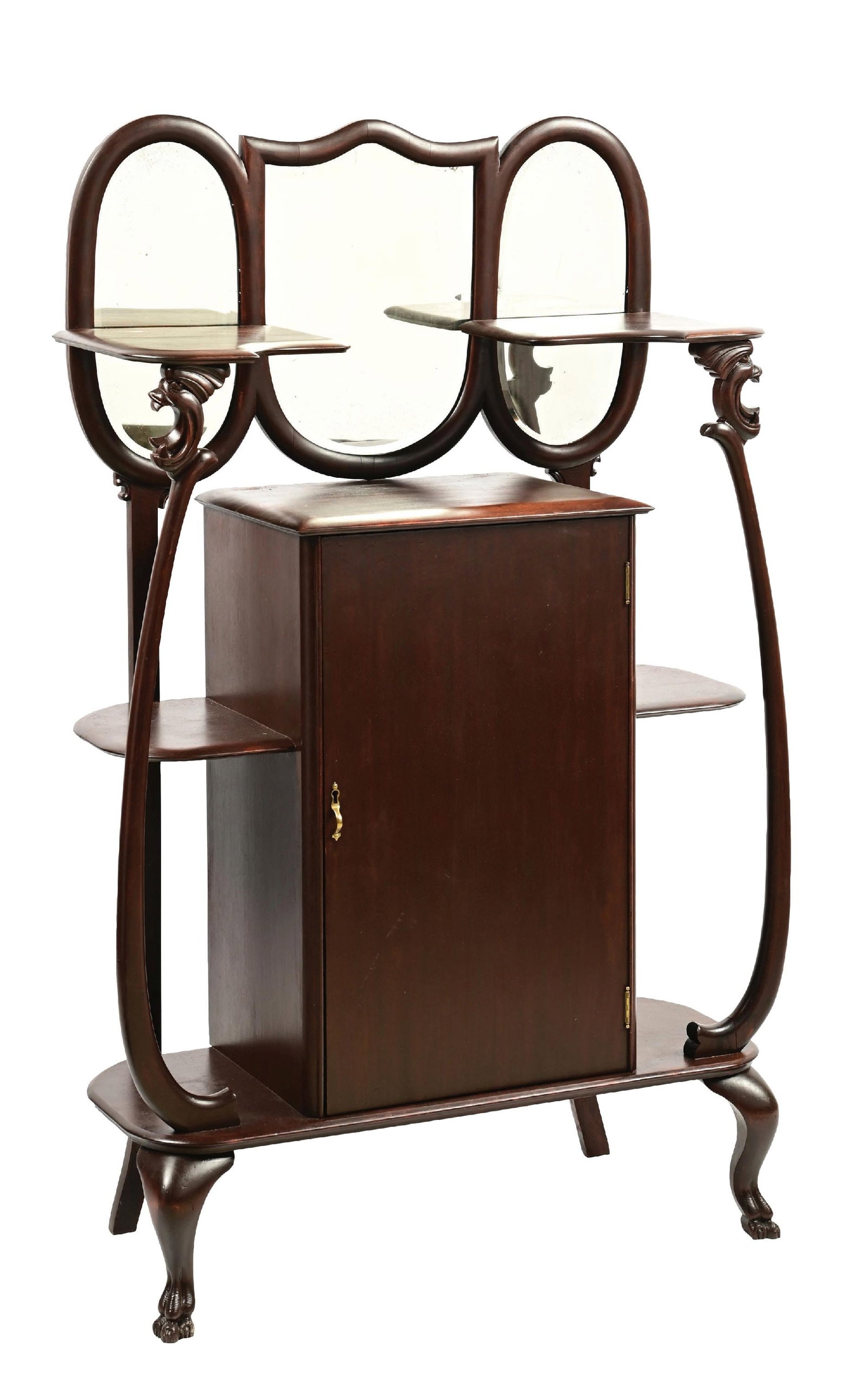 MAHOGANY CURIOLE MUSIC STAND & CABINET: It shows all mahogany oak construction with carved mahogany faces on the self supports on the left and right of the middle. The center compartment is sheet music or record storage with shelves on eith