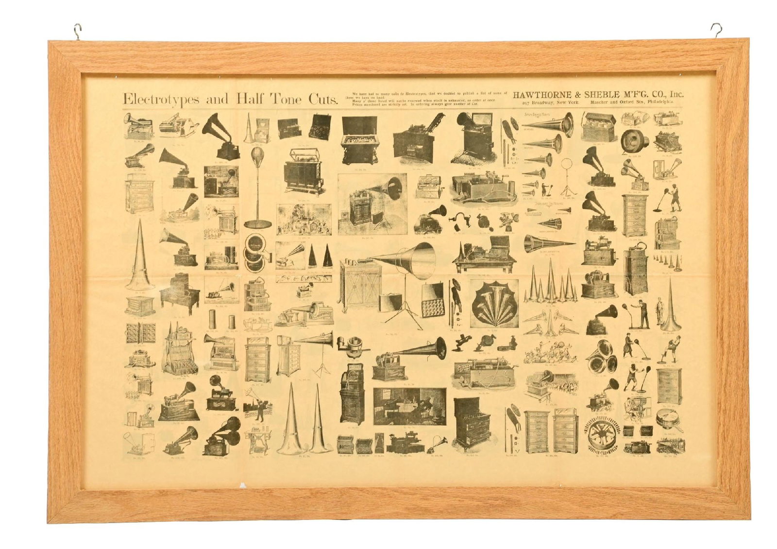 2-SIDED FRAMED EDISON CONCERT NEWS BROADSIDE: Framed to show both sides of the original broadside, labeled "Electrotypes and Half Tone Cuts" from Hawthorned & Sheble M'F'G Co., Broadway, New York and Philadelphia, Pennsylvania. Light folds from