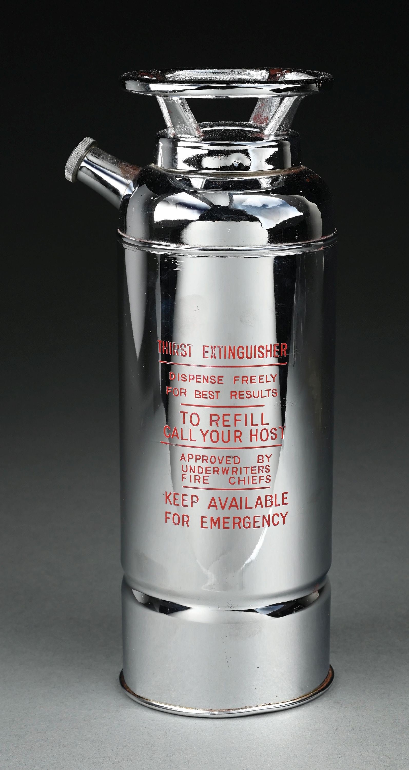 MUSICAL COCKTAIL THIRST EXTINGUISHER APPROVED BY UNDERWRITERS FIRE CHIEF: C. 1930s–1940s. A novelty Art Deco chrome-plated cocktail shaker modeled in the form of a fire extinguisher, commonly referred to as a “Thirst Extinguisher”. The cylindrical body