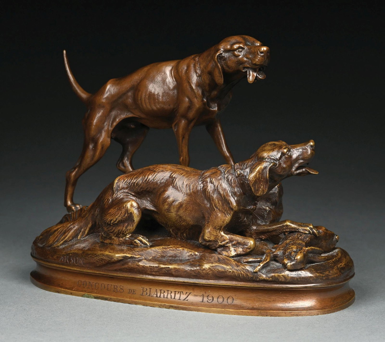 ALPHONSE ALEXANDRE ARSON (FRENCH, 1822-1882): "Concours de Biarritz 1900" 19th century bronze animal sculpture with rich brown patina Depicting a naturalistic scene of two hunting dogs, possibly English Setters claiming their prey. Inscribed on t