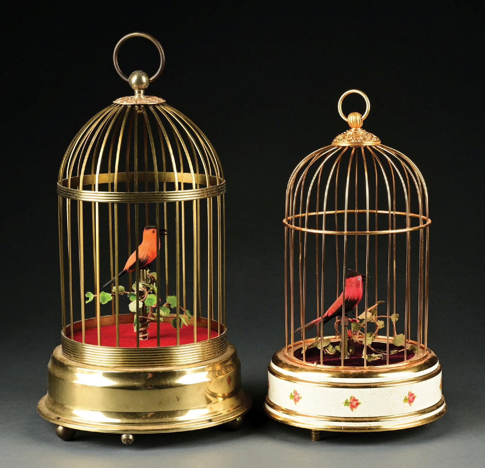 PAIR OF GERMAN SINGLE BIRD CHIRPING AUTOMATONS: (A) Great color and in good condition. Showing very little wear, currently not operational. (B) Great color and in good condition, with tight cage and no bends. Showing little wear, currently not oper