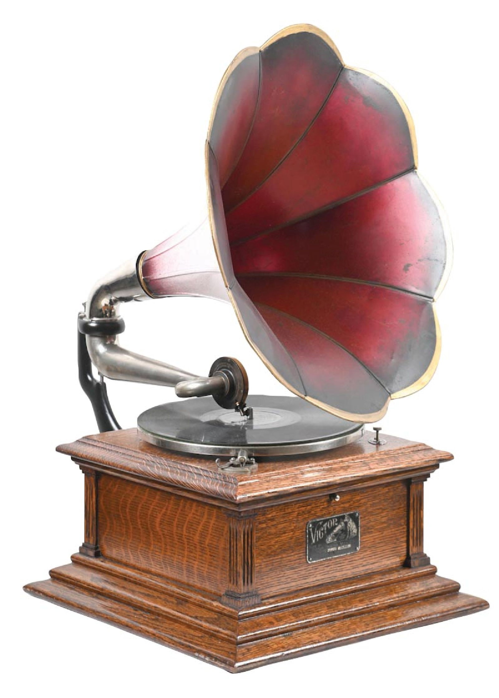 VICTOR TYPE III DISC PHONOGRAPH: C. 1910. Showing an older refinishing to the oak cabinet with correct Victor labeling. Correct crank, correct reproducer, correct tone arm, and correct turntable with old felt. Comes with a small