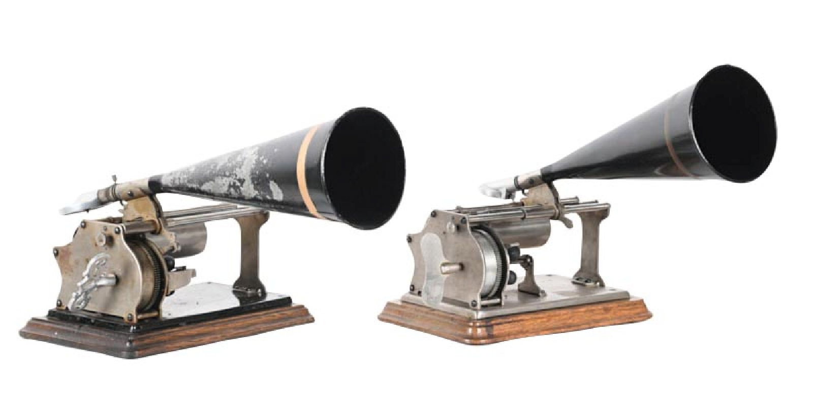 PAIR OF SMALL COUNTERTOP CYLINDER PHONOGRAPHS: C. 1900. (A) Columbia Graphophone Type Q cylinder phonograph in all original condition, with replaced tin horn, correct mandrel and correct reproducer. Operational and with key. (Very Good) (B)