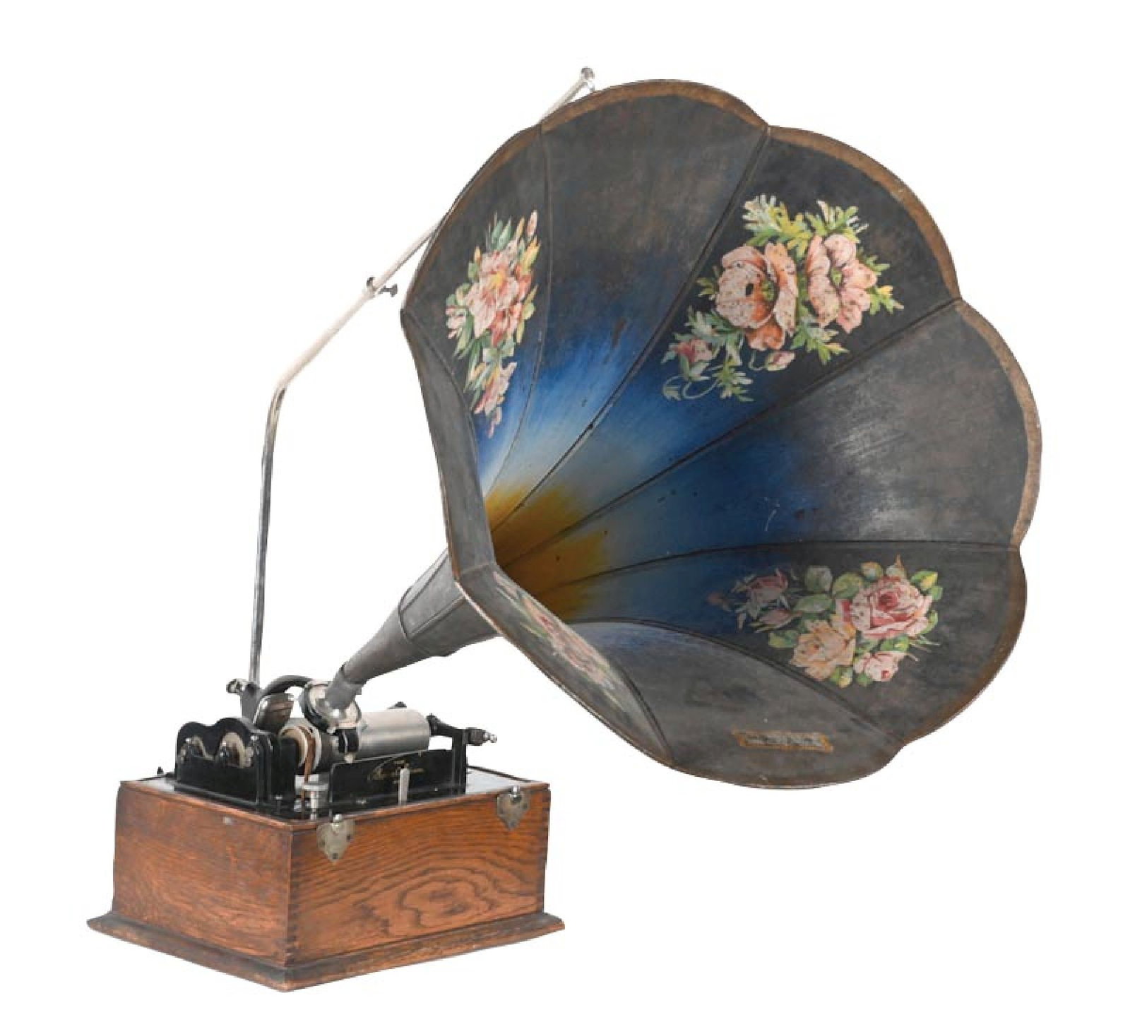 THOMAS EDISON CYLINDER PHONOGRAPH SERIAL NO. S23224: C. 1900. Oak case with original reproducer, mandrel, crane, and paneled tin horn in original paint, showing moderate oxidation and loss of paint to the horn. The phonograph is fully operational and