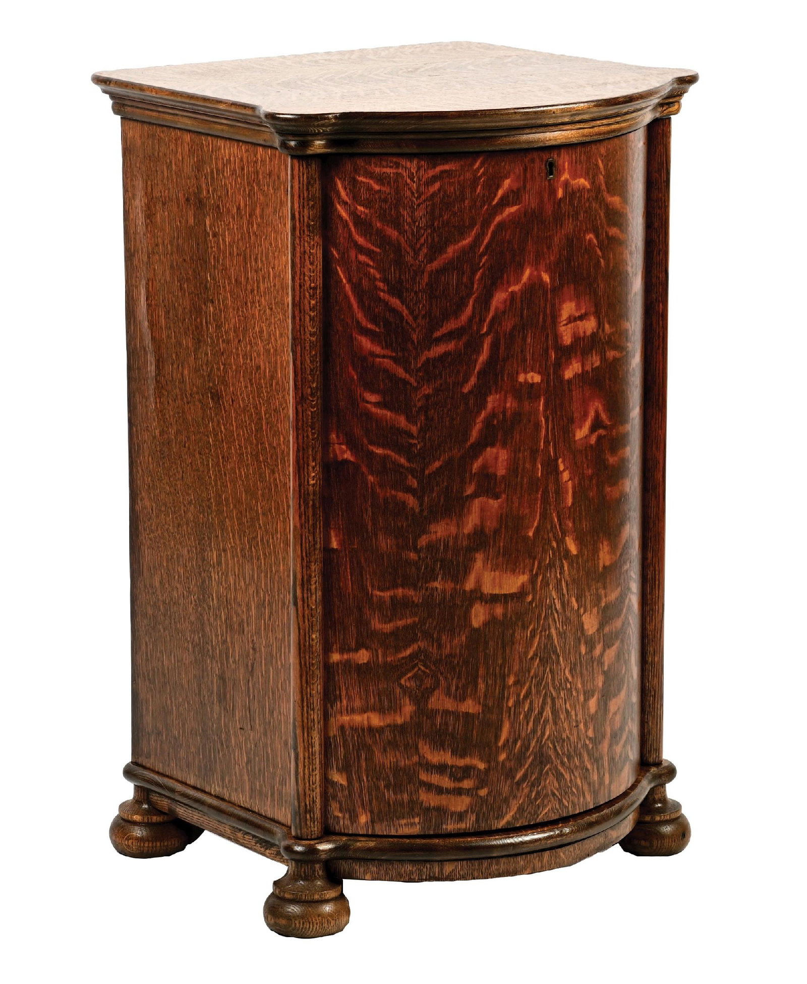 BOMBAY FRONT OAK CYLINDER PHONOGRAPH STAND: An all original phonograph stand with full interior of spindles. It shows areas of wear, scuffs, and scrapes from use. This is not a standard shippable item and will require 3rd party shipping or