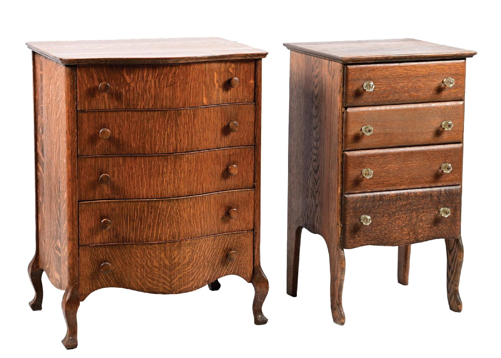 PAIR OF PHONOGRAPH STANDS: (A) A cylinder phonograph stand with Bombay front, no internal spindles, and wood pulls. It shows light wear overall. (Good). (B) A cylinder phonograph stand with no internal spindles and new drawer p