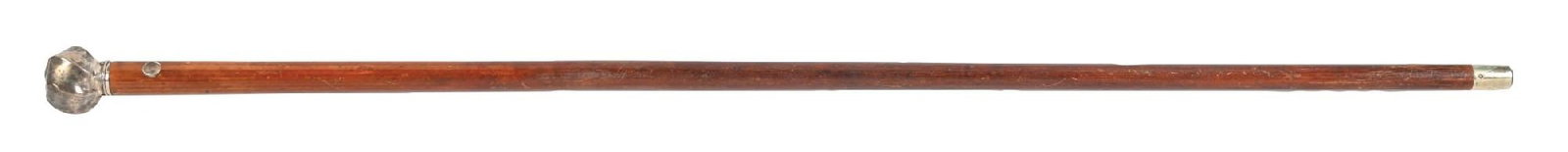 HOLUSKA WATCH CANE WITH ROUND SILVER HANDLE: C. 1880s-1900. A neat Holuska watch cane featuring a round silver handle with a hallmarked coin silver handle and collar. The collar is marked with the maker’s initials “T.P.”. The c