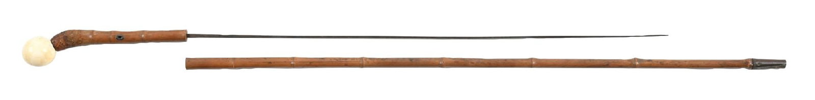 WHALEBONE HANDLE SWORD CANE: C. 1800s. A stunning cane with a round whalebone handle and bamboo shaft with a hidden sword in the shaft. There are four cracks in the bamboo, normal wear and tear on the ferrule as well as on the