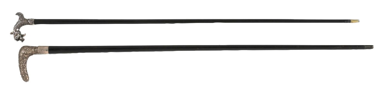COLLECTION OF 2: SILVER DRAGON DRESS CANE & SILVER CHERUB DRESS CANE: (A) C. 1880–1910. A neat silver-toned metal handled cane featuring a small curved silver handle in the shape of a dragon, ebony shaft, metal ferrule. Initialed "MR". Typical patina and very mild
