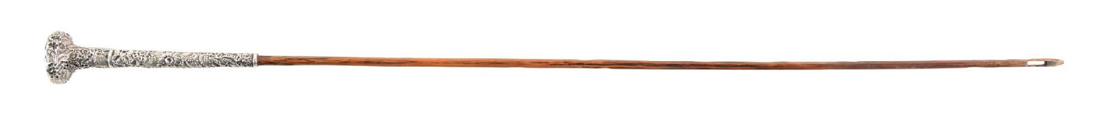 ANTIQUE WALKING STICK WITH FLORAL DESIGN SILVER HANDLE: C. 1890–1915. Sterling silver repoussé floral handled walking cane featuring high-relief floral decoration extending from the domed pommel through the grip, with monogrammed foliate cartouc