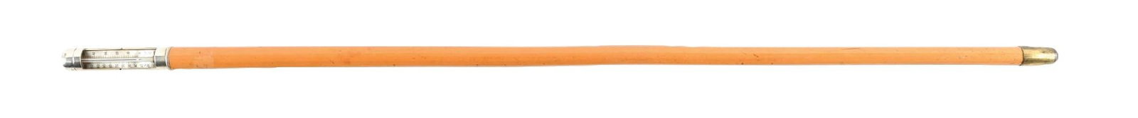 ANTIQUE WALKING STICK CANE WITH WOOD SHAFT AND METAL THERMOMETER TOP HANDLE: C. 1900–1920. Sterling silver thermometer walking cane with removable cap housing a dual Fahrenheit and Celsius thermometer. Marked sterling silver mount above an amber or honey-toned shaft,