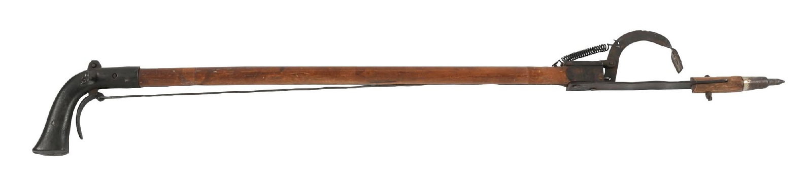 CARPET STRETCHER CANE: C. 1900. A neat carpet stretcher cane made of beech wood with an iron handle, on the side of the handle is the patent date, Dec, 11 1900. A lever beneath the grip causes a toothed hinge on the bottom