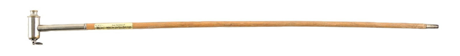 WHISTLE STICK CANE W/ LABEL FROM THE ESTATE OF "MILKY" THE TWIN PINES MAGIC CLOWN: C. 1890–1920. Siren walking cane featuring a metal Acme Siren whistle handle stamped “The Acme Siren — England,” mounted to a hardwood shaft with metal collar. This cane also