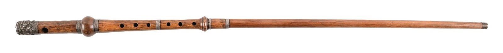 ANTIQUE CARVED WOOD FLUTE WALKING STICK CANE: C. 1920–1940. Czechoslovakia Waldes musical walking cane featuring a wooden flute constructed of turned hardwood with multiple metal decorative bands and detachable mouthpiece section. Very