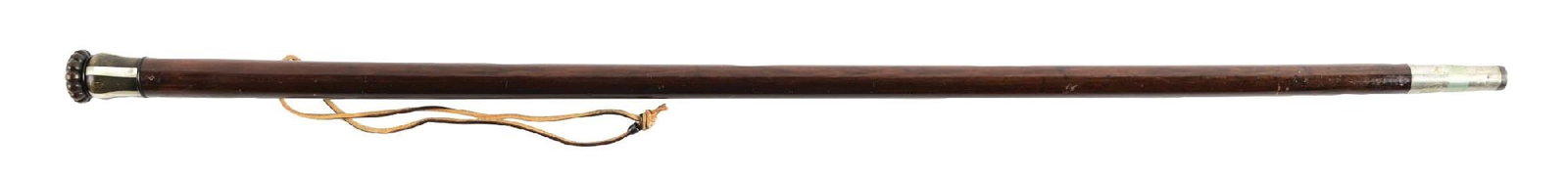 ANTIQUE MOTHER-OF-PEARL INLAY CARVED TOP WITH LEATHER WRIST CORD WALKING STICK: C. 1880–1910. Victorian carved hardwood walking cane with bulbous pommel handle featuring vertical mother-of-pearl or bone inlay panels and circular top cartouche. Fitted with a leather cord wri