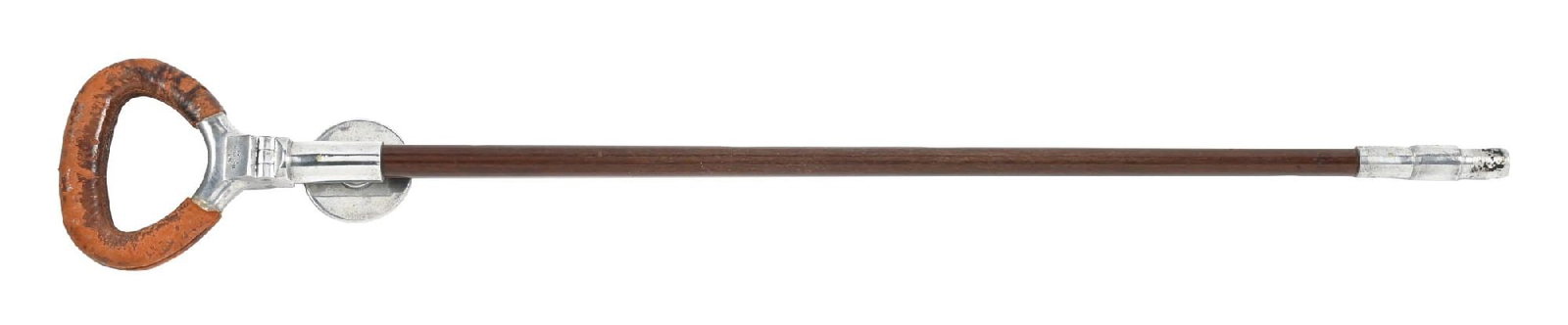 LARGE FUNCTIONAL STICK CANE: C. 1900–1930. A functional stick seat cane featuring a large grip handle wrapped in leather over nickel-plated metal. The cane is mounted on a dark wooden shaft and terminates with a metal