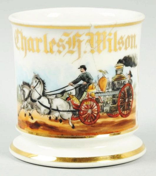 Horse-Drawn Fire Wagon Shaving Mug.: Has "Charles Wilson" in gold gilt. Very little loss of gold with one double hairline crack above the last name. Condition (Very Good). Size 3 - 3/4" T.