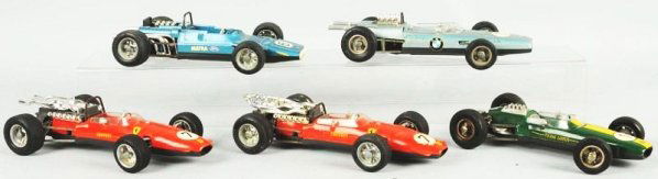Lot of 5: Schuco Wind-Up Race Cars.: German. Tin and plastic. Working. Includes Ferrari, BMW, and others. Various conditions. Condition (Very Good). Size Largest: 10" L.