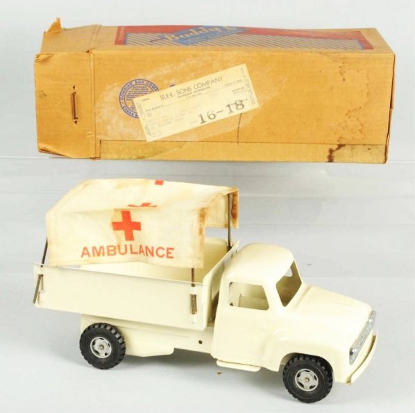 Pressed Steel Buddy L No. 5558 Ambulance Toy.: American. Old store stock. Very scarce truck with original ambulance canvas top. Canvas top is slightly soiled due to age. Very little wear overall. Includes original box with some tearing to outside 