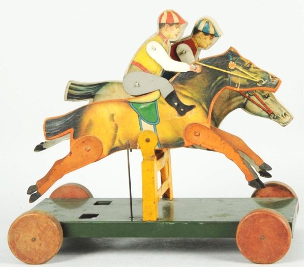 Early Paper on Wood & Tin Horse Race Toy.: American. Not marked but probably Gibbs. Paper on wood horses with jockeys riding on top. Tin platform with wooden wheels. Horses are articulated. Some creasing and staining to paper on horses and som