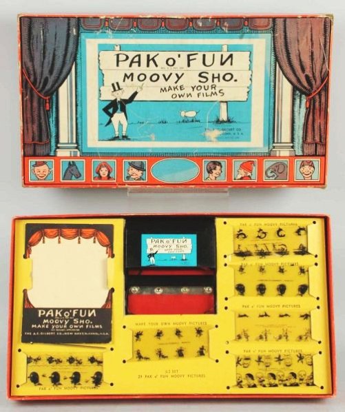 A.C. Gilbert Pak O' Fun Moovy Sho.: Pre-war. Very unusual piece that has 12 film strips, cardboard movie screen, and projector box with light bulbs. Includes original box marked "Copyright 1933". Some paper wear and loss to front of box